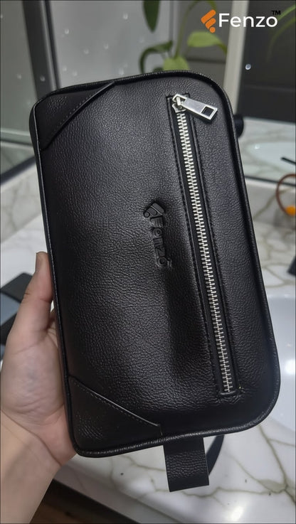 Close up of Fenzo black genuine leather travel kit with durable side handle.